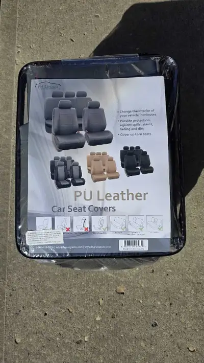 Protect your car seats with this brand new grey set of PU leather car seat covers designed to change...