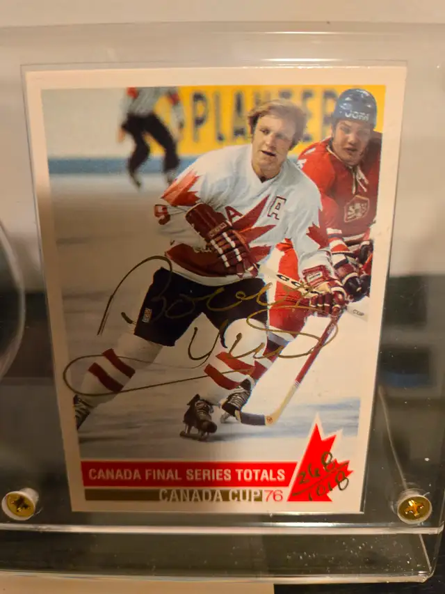 Bobby Hull Autographed Canada Cup card and Black Hawks puck62864366044290121