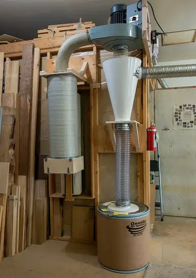 Oneida cyclone and dust bin, Wynn exhaust filter, ~30' of 5" spiral pipe, 5 blast gates, assorted le...