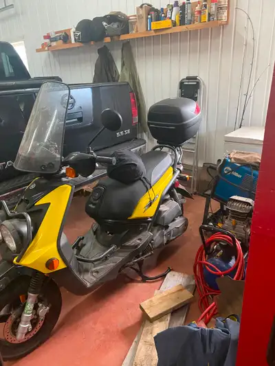 2009 Yamaha, works excellent and an excellent condition. Fuel injected, very low mileage, rear cargo...