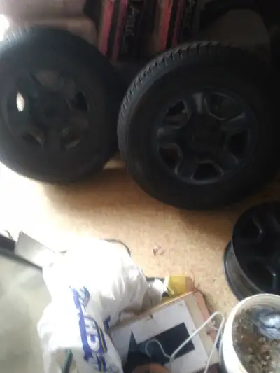 2 have good winters as well 17 inch wheels and caps in like new condition!