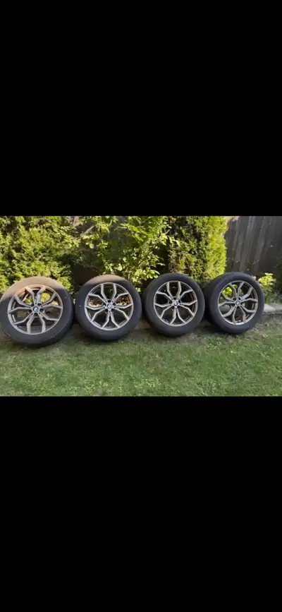 245 50 19 tires on BMW OEM rims Bought 4 years ago and had 3 winter uses 2 tires are new (2 year old...