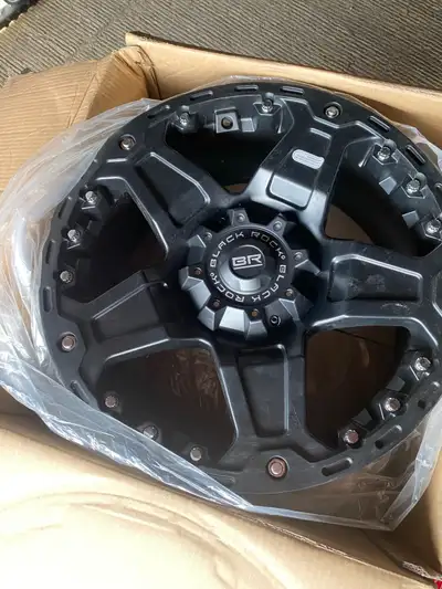 4 brand new Black Rock Wheel, a stylish and durable option for your vehicle. This wheel combines rob...