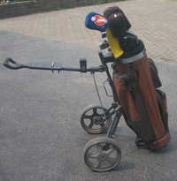 For sale:  Golf clubs, pull cart, carrying bag, protective socks