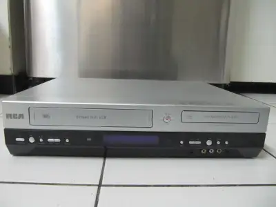 Up for sale is a RCA model DRC8320N 6 Head Hi-Fi VCR & DVD Recorder & Player. Part of a business liq...