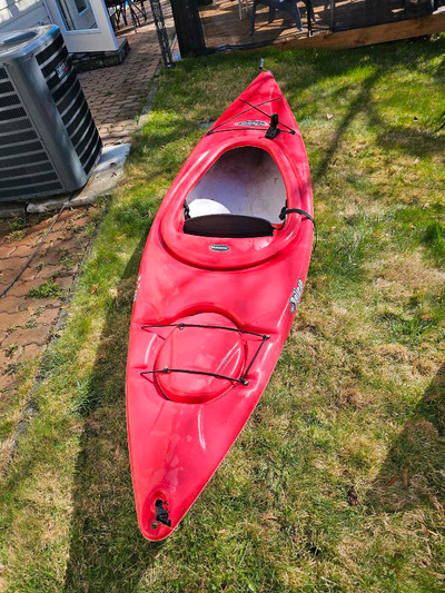 Red Kayak with fishing rod holder