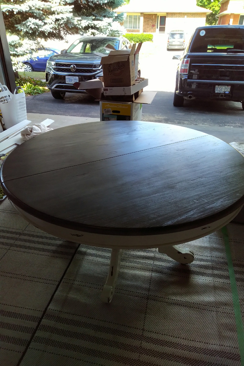 Solid wood round dining table from Cornerstone Dining Tables & Sets
