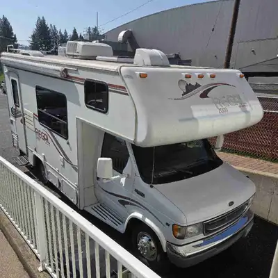 2000 Regal (made by Triple E) 20' long, 23' with the aluminum, wired storage box mounted on the back...