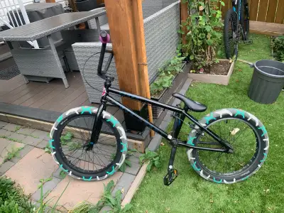 Bmx bike slightly used custom wheels pedals and grips Verry good condition spare tire included in sa...
