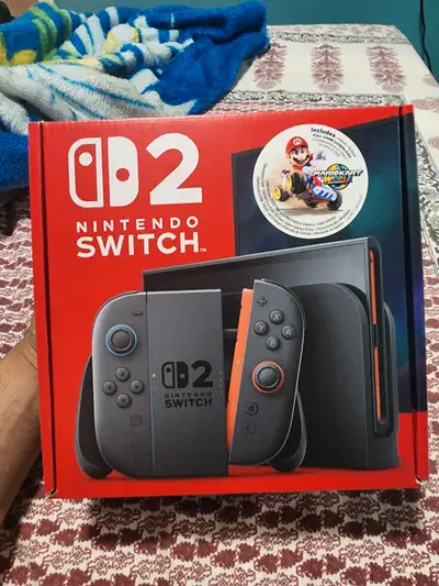 Brand new mario kart switch 2 with sealed copy and flip side cover of paper mario thousand year door...