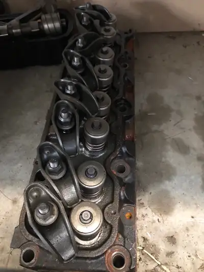 Good condition merc 3.0 cylinder head. Includes all valves, springs retainers ect. Valve guides are...
