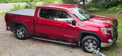 124000 kms.. 4x4.. no accidents .. excellent condition... towing package..tonneau cover...heated ste...