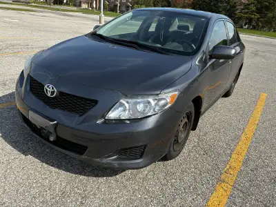 Reliable and fuel-efficient 2010 Toyota Corolla in good running condition. Great commuter or first c...