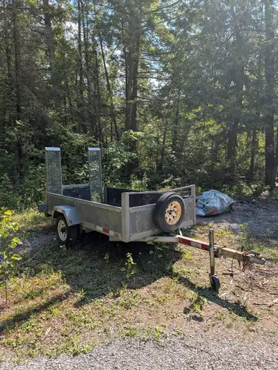 4'4" inside dimension x 8' Steel Utility Trailer Comes with a spare mounted on the front Very good c...