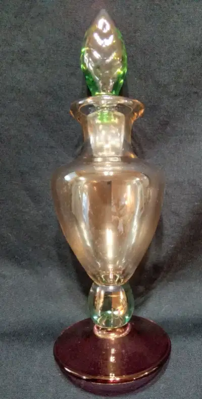 This is a lovely tricolor, iridescent perfume bottle, with the colors green, pink and amber. This be...