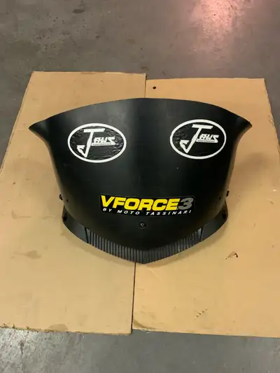 Windshield and windshield base and guage housing. The complete package. Came off Skidoo 1000 SDI fro...