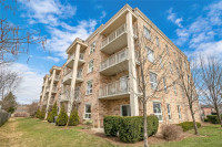 Gorgeous 1 Bed 1 Bath Mainfloor Corner Condo with Private Patio