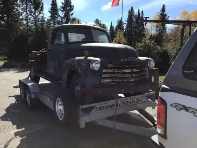 1950 chev truck parked in barn for 30 yrs, have ownership, had a 9 foot stake bed asking 5800