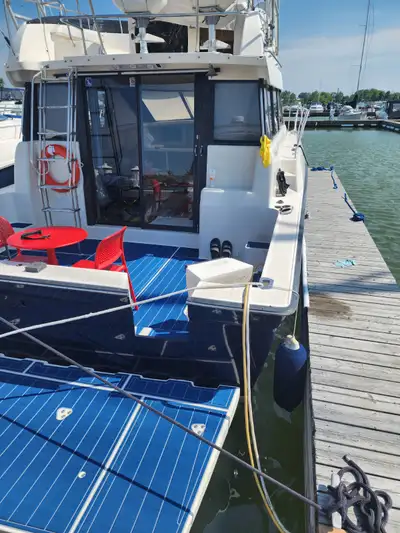 Well maintained 37' Silverton Convertible. Updates include. Engineered hard would throughout cabin,...