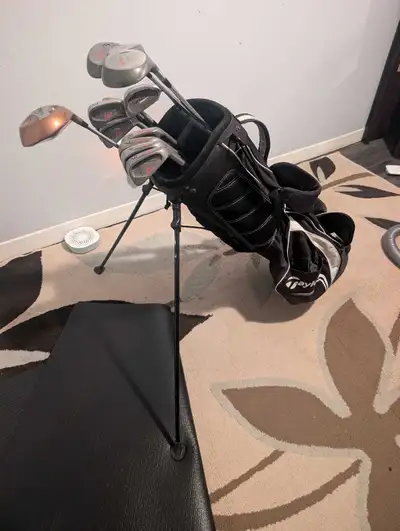 golf clubs and stand bag, View more