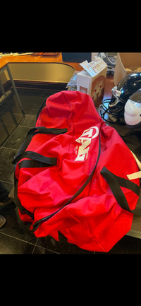 Football grand sac Tag rouge excellente condition