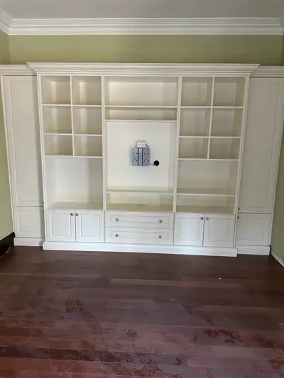 This is a used, but well-maintained, built-in wall unit, perfect for a living room or entertainment...