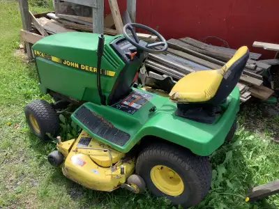 John Deere LX188, motor needs rebuild/replacement. Mower deck is prestine, and mower ran like a top...