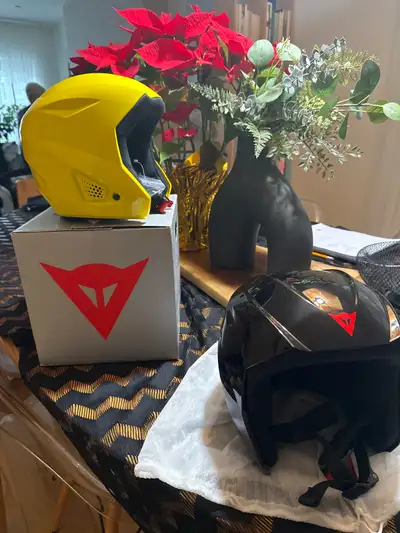 I'm selling a brand new (yellow) and a used (black - one season, minor scuffs) Dainese helmet for ki...
