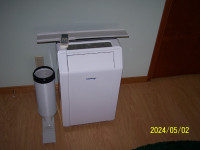 Portable air conditioner dehumidifier