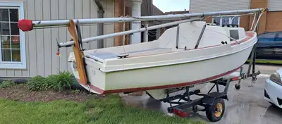 16’ sailboat. No motor. Good PROJECT boat. Needs fibreglass work