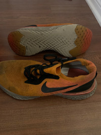 Nike shoes beight orange for running size 9