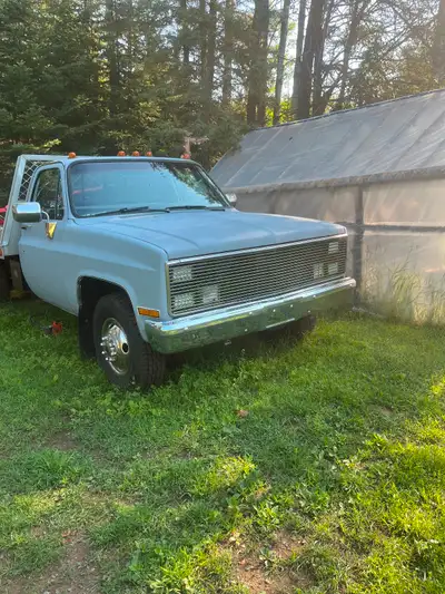 1988 tilt deck 6.2l diesel needs very little for safety .. Moving must sell $7500 obo trade welcome