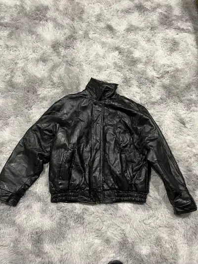 I'm selling a Frondini Fashions men’s leather jacket, size large, perfect for adding a touch of clas...