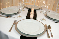 Round white Tablecovers for rent