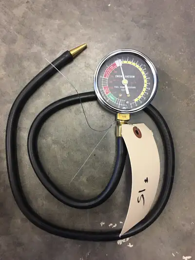 Two different meters One is Engineering Controls International Low Pressure Test set 0-20 ounces/per...