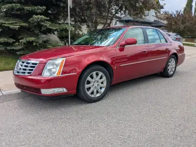 Pappi's coveted Cadillac DTS is for sale. It only has 66,000 km on the odometer! Owned it since new....