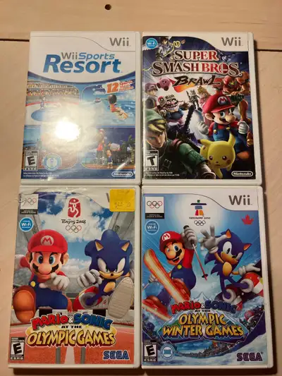 8 Nintendo Wii video games. Many Mario games including Super Mario Smash Bros Brawl. Wii Sports Reso...