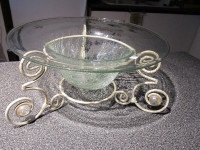 Decorative cracked glass bowl set in metal base.