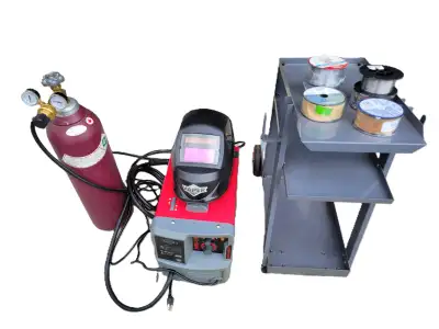 The welder used very little, almost like new. - Welder kit included: Welder, welder cart, auto-darke...