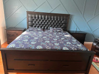 King size wooden bed with side tables