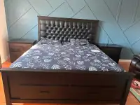 King size wooden bed with side tables