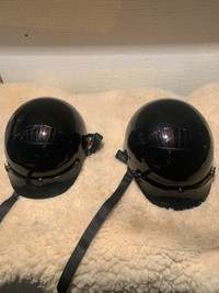 two motorcycle helmets