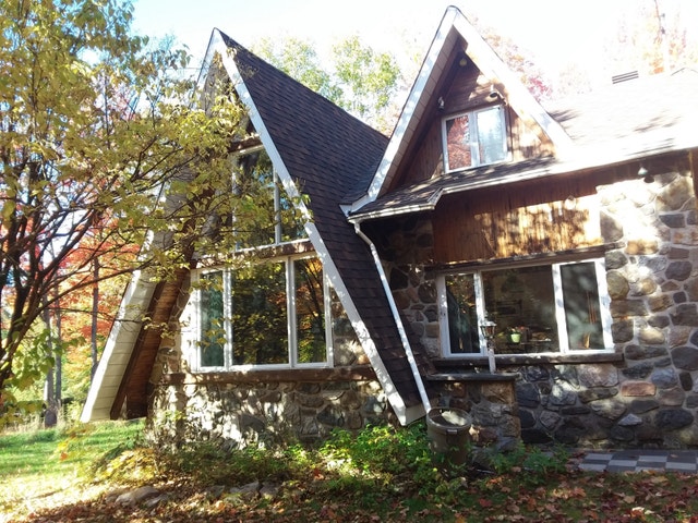BELLE MAISON SCANDINAVE À VENDRE À SAINT-CALIXTE  CUL DE SAC — photo 1