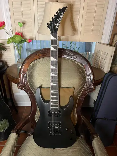 Jackson JS Series electric guitar in a matte black finish, View more
