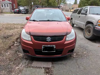 As is. New car coming. Engine and transmission are good. Fun car. Capable in winter. 6 speed manual...