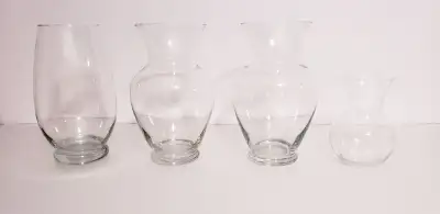 4 nice glass flower vases, View more