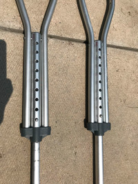 Adjustable height crutches
