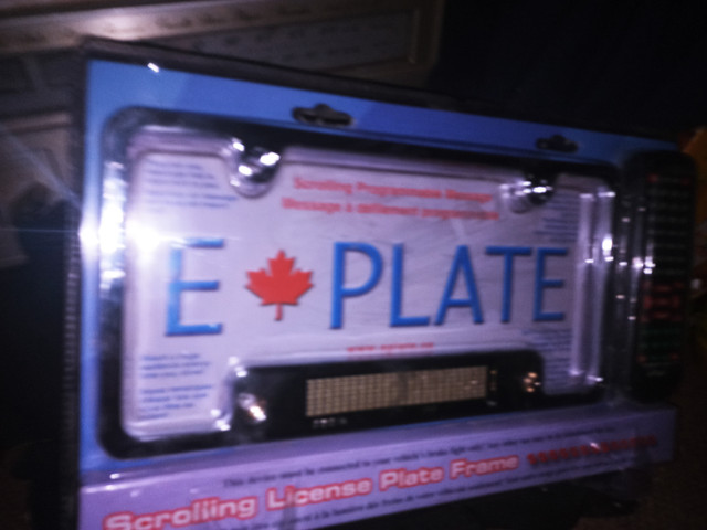 SCROLLING  LICENSE PLATE  FRAME in General Electronics in Sarnia