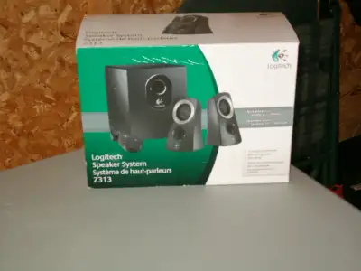 I am selling an Logitech Speaker System(new). Never opened, still in original package. Must see! See...