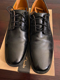 Men’s black leather dress shoes (size 7)